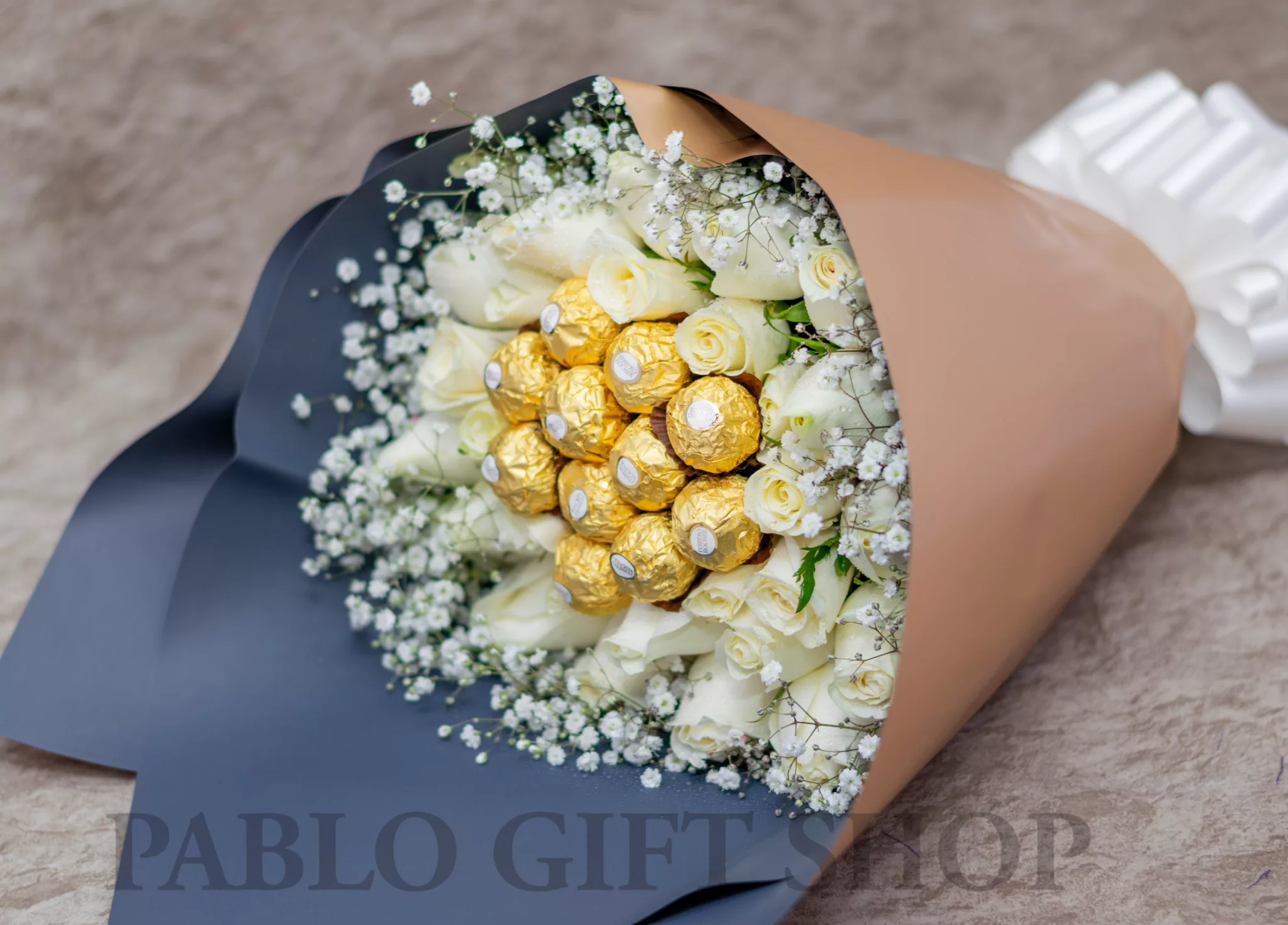 Baby breath with White Roses and Ferrero chocolates Bouquet