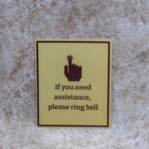 Gold-Tone Assistance Sign
